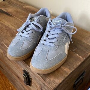 Blue suede Reebok sneakers
